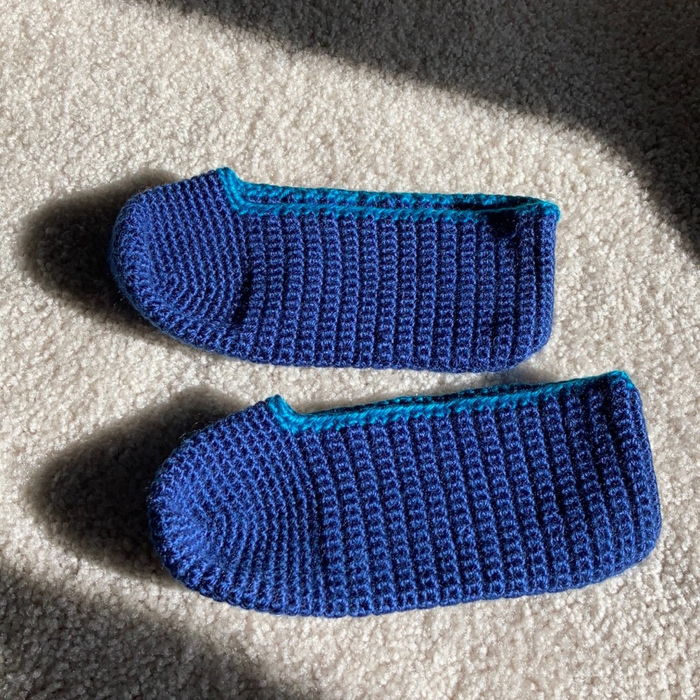 Handmade crochet blue slippers with turquoise rim